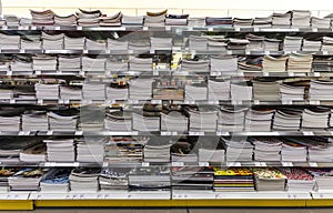 Back to school. Wall notebooks from school. Shelving shop.