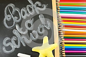 Back to school written on blackboard