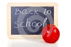 Back to school written on blackboard slate