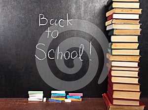 Back to school written on chalkboard