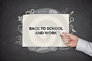 Back to shool and work Concept on black blackboard