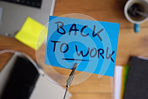 Back to work written on a memo