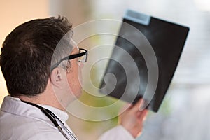 Doctor reading X-ray images