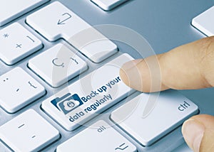 Back up your data regularly - Inscription on Blue Keyboard Key