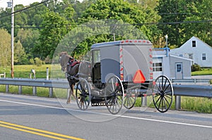 Back view of Amish horse and buggy