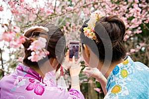 Back view of asian chinese female tourists