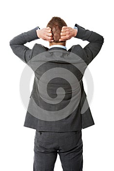 Back view businessman putting hands on the nape