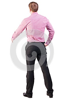 Back view of businessman in red shirt out to shake hands