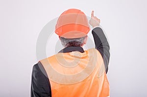 Back view of engineer pointing something