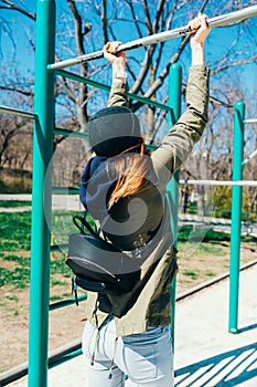 Back view female dressed in casual clothes