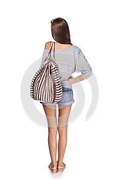 Back view girl with backpack