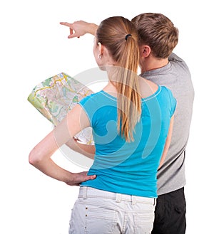 Back view journey of the young couple looking at the map
