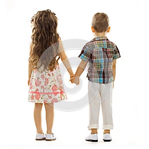 Back view of little kids holding hands