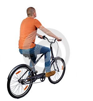 Back view of a man with a bicycle.