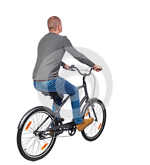 Back view of a man with a bicycle.