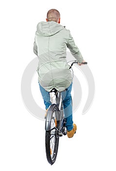 Back view of a man with a bicycle.