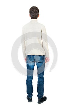 Back view of man . Standing young guy.