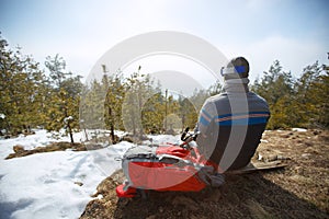 Back view of mountaineers while sitting and resting