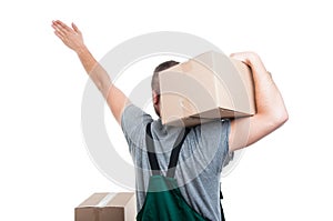 Back view of mover guy holding box showing direction