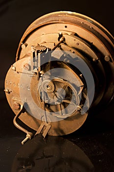 Back view of an old clock showing the insides