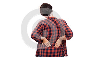 Back view of pin-up girl wearing glasses showing back pain gesture.