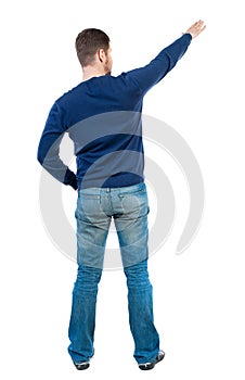 Back view of pointing business man.