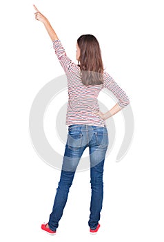 Back view of pointing woman.