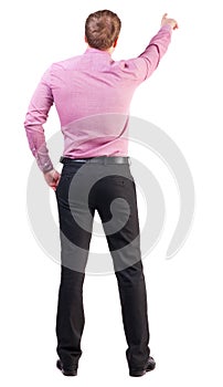 Back view of pointing young business men in pink shirt