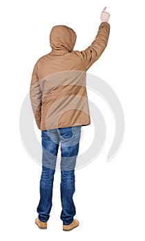 Back view of pointing young men in parka.