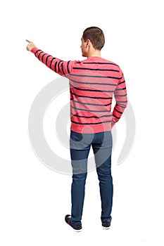 Back view of pointing young men in shirt and jeans