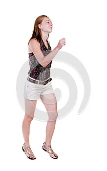 Back view of running woman in shorts