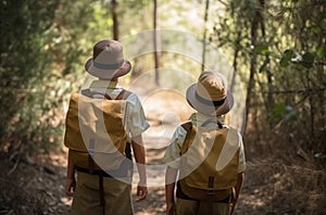 Back view of scout boys in forest. Generate Ai