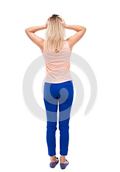 Back view of shocked woman.