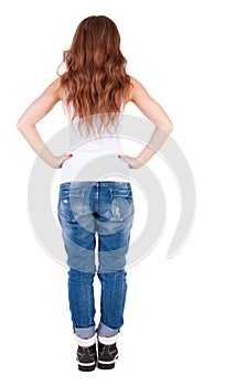 Back view of standing young beautiful woman