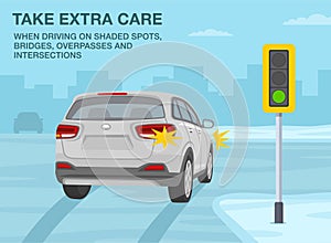 Back view of suv turning right. Take extra care when driving on bridges, shaded spots and intersections.