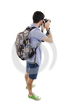 Back view of tourist photographer man taking picture