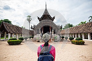 Back view of traveler at temple in Chiangmai,Thailand photo