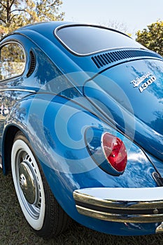 Back view of vehicle Volkswagen Beetle Fusca model 1300 on display at the monthly meeting of vintage cars