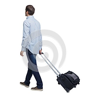Back view of walking business man with suitcase