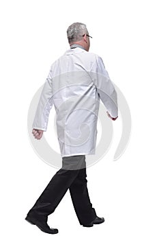 Back view walking doctor in a robe hurrying to help the patient