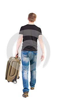 Back view of walking man with suitcase.