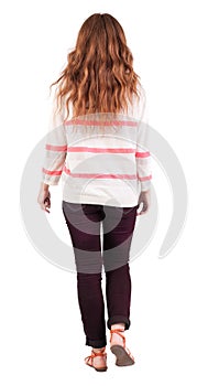 Back view of walking woman