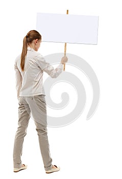 Back view woman showing sign board.