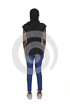 Back view of a women with casual clothing and burka