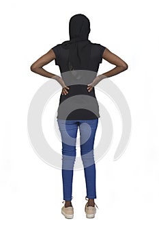 Back view of a women with casual clothing and burka arms akinbo