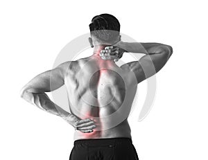 Back view of young man with muscular body holding his neck and low back suffering spinal pain