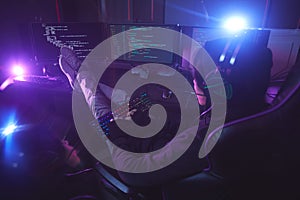 Computer Programmer Working in Dark