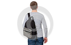 Back view. Young man wearing blank long sleeve t-shirt and backpack isolated on white background. Copy space. P