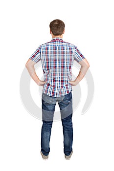Back view of young men in shirt and jeans