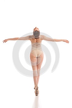 Back view of young modern ballet dancer isolated on white background